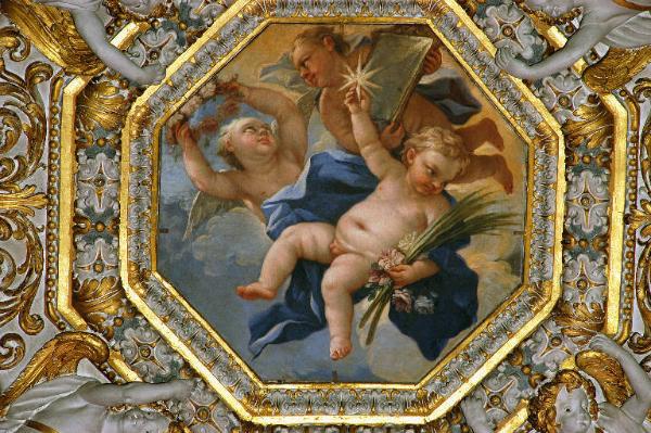 Angioletto con simboli mariani: stella, specchio e corona di rose