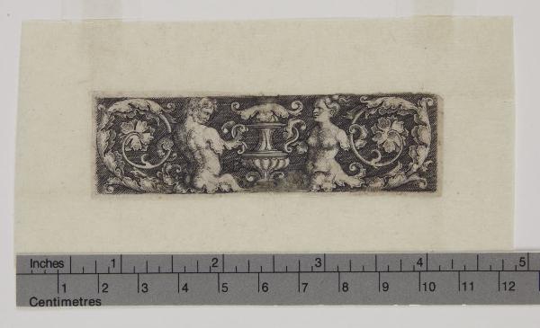 Ornamento con un uomo e una donna