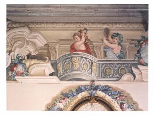 Putti con strumento musicale